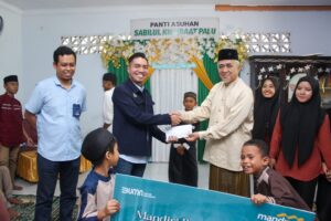 Bank Mandiri Salurkan Bantuan untuk 100 Anak Yatim dan 500 Paket Sembako di Kota Palu