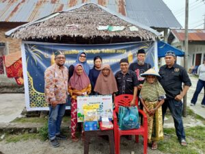 PWI dan IKWI Sulteng Salurkan 85 Paket Sembako ke Warga Banawa